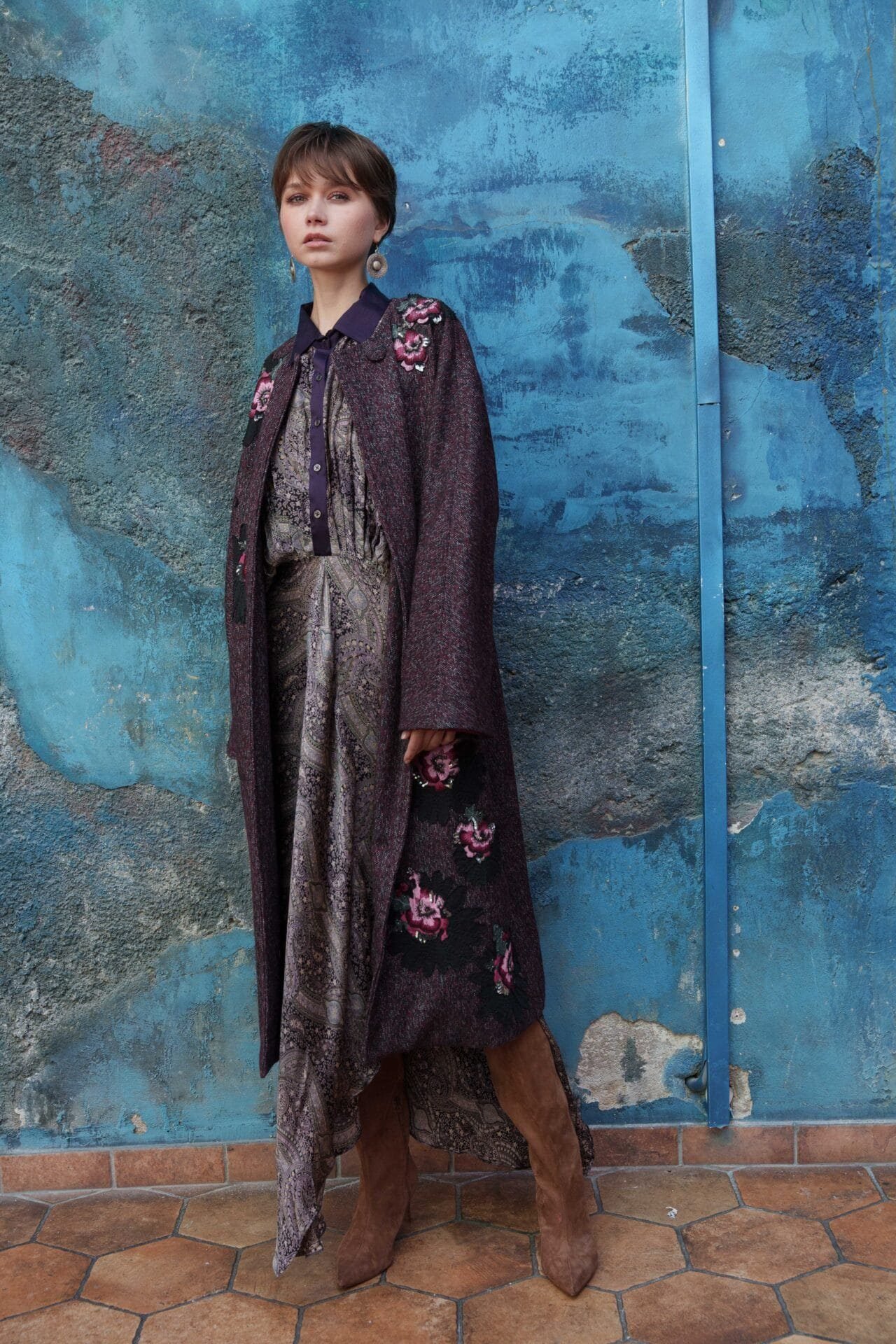 Maroon and black trench coat with f