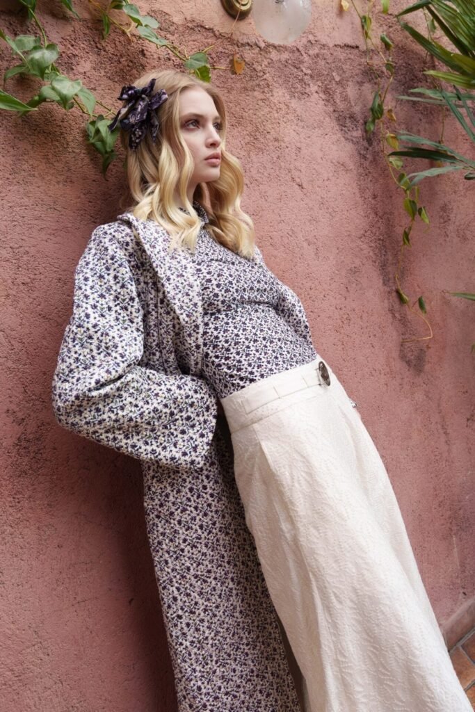 White knit printed turtle neck top