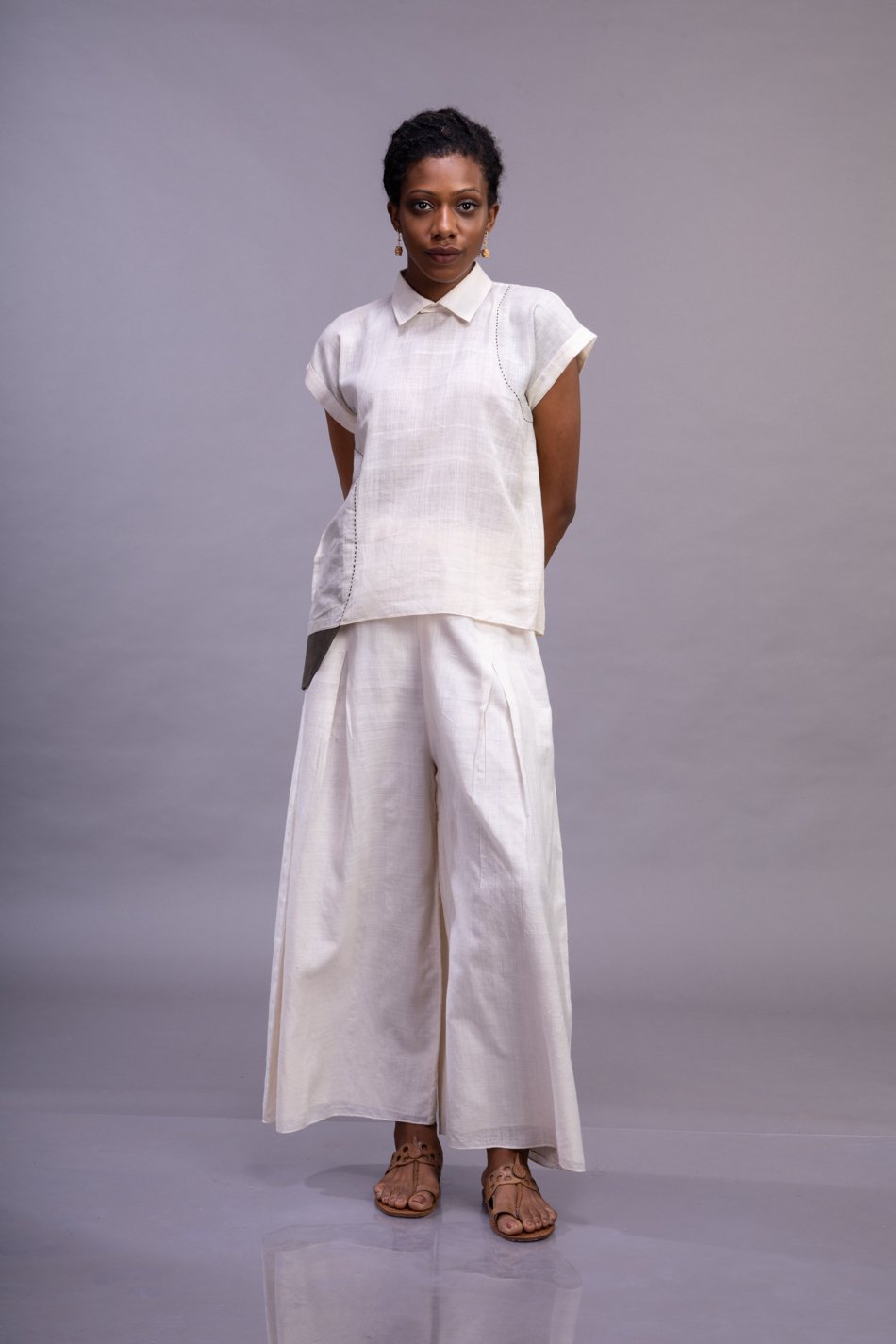 Ivory Pleated Palazzo Trousers